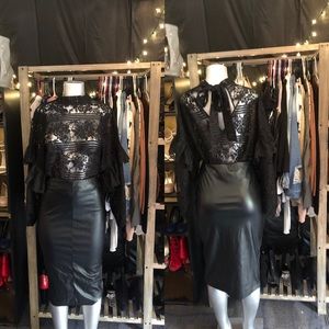 Black blouse with faux leather pencil skirt